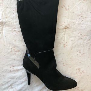 Never worn black knee high boots